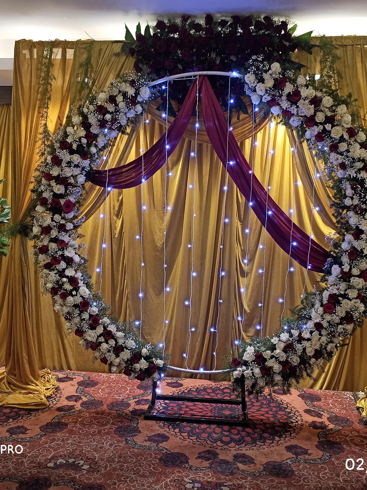 Floral arch and engagement decoration setup in Bengaluru by We Decor Events